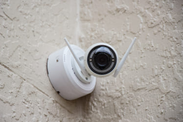 A wall camera mounted on a wall.